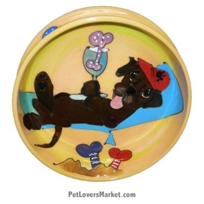 Chocolate Labrador Dog Bowl (Hersey Louie). Ceramic Dog Bowls; Designer Dog Bowls; Cute Dog Bowls. Dog Bowls are Made in USA. Hand-painted. Lead Free. Microwave Safe. Dishwasher Safe. Food Safe. Pet Safe. Design features Chocolate Labrador dog breed suntanning at dog beach with beach chair.